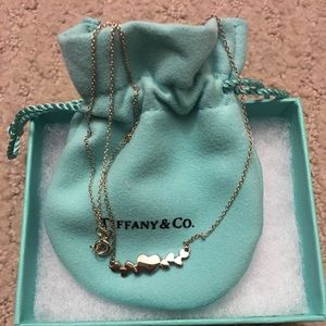 Tiffany & Co. multi hearts necklace.